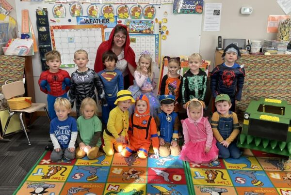 Lisa and a group of students dressed up for Halloween