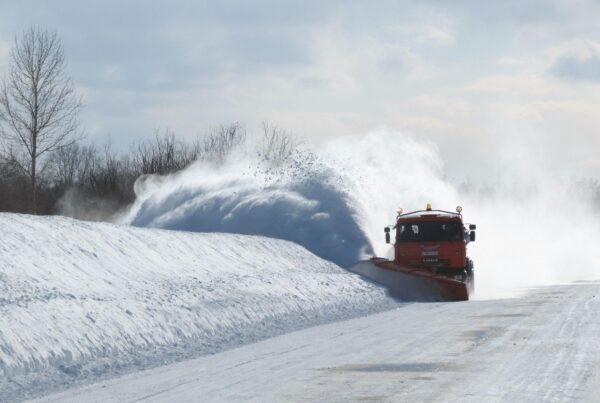 church service cancelled due to snow - snowplow plowing road