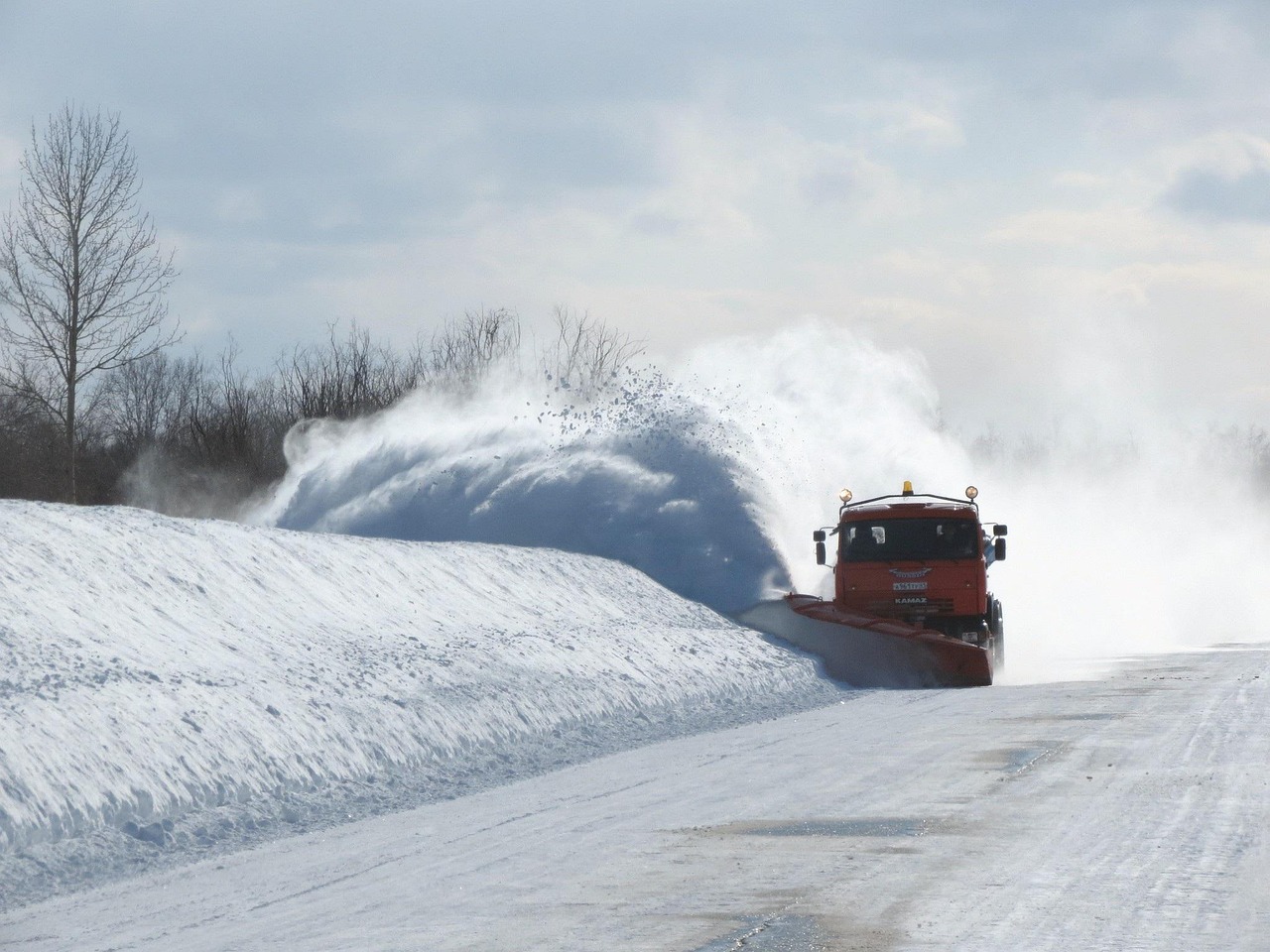 church service cancelled due to snow - snowplow plowing road